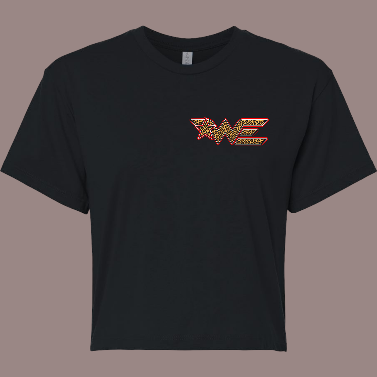 Black T-shirt with a leopard-print 'WE' logo outlined in red on the left chest, alongside a leopard-print star trustly near the letters.