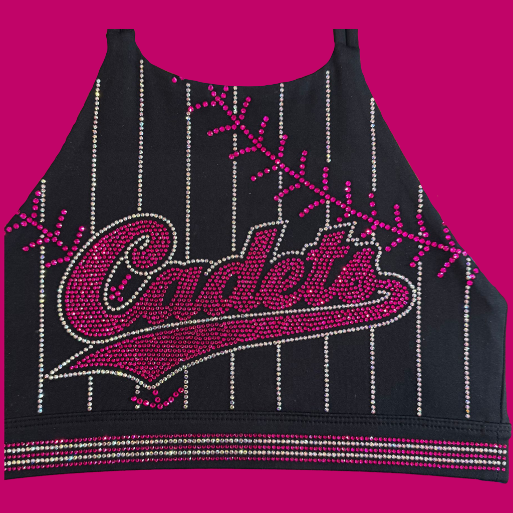 Black sleeveless top adorned with pink and clear rhinestones forming the word 'Candies' and vertical bead lines on a magenta background