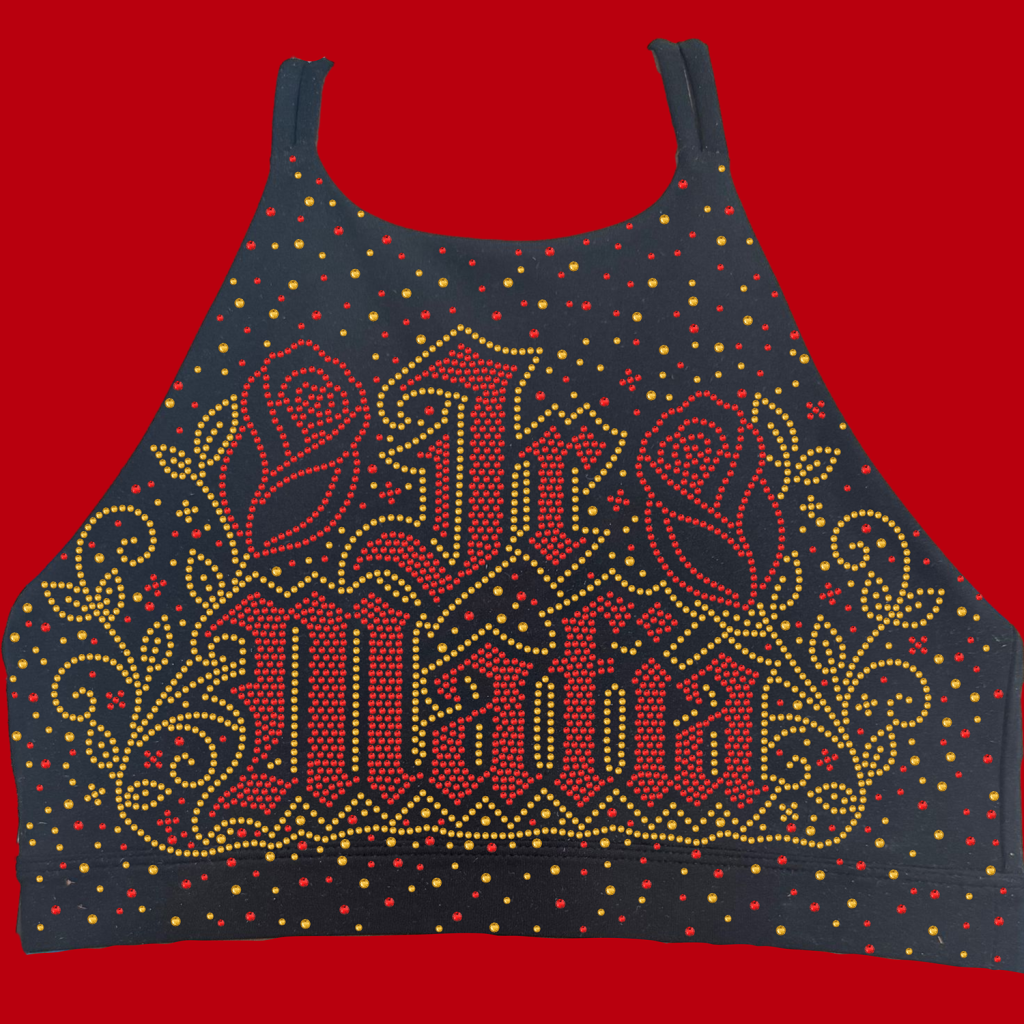 Black sleeveless top with an elaborate red-and-gold beaded pattern on dark fabric against a red background.