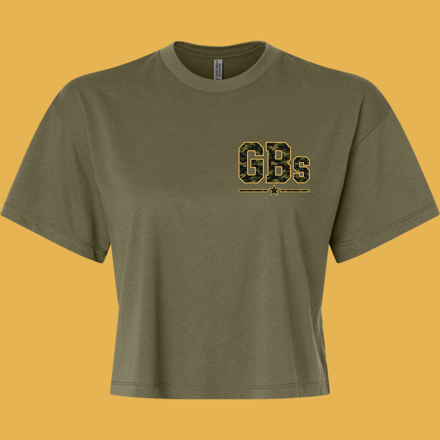 Olive T-shirt with a camo 'GBS' logo outlined in gold on the left chest, plus decorative lines and a star underneath.
