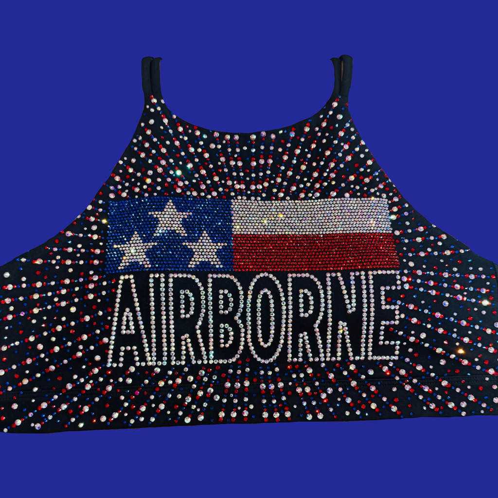 Beaded sleeveless top with an American flag motif and the word AIRBORNE spelled in rhinestones across the chest.