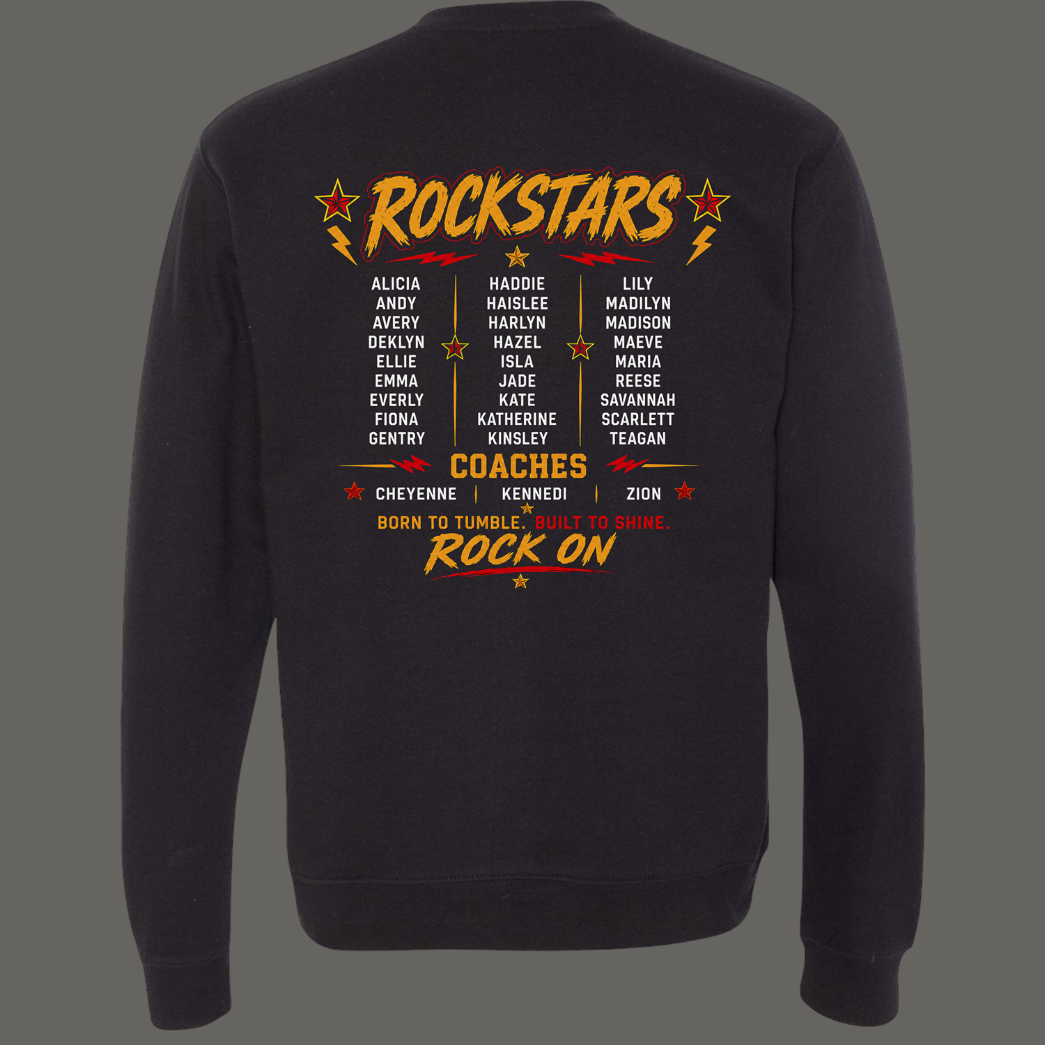 Back of a dark sweatshirt showing a rockstars coaches roster graphic with three columns of names, stars and lightning bolts in yellow/red/orange.