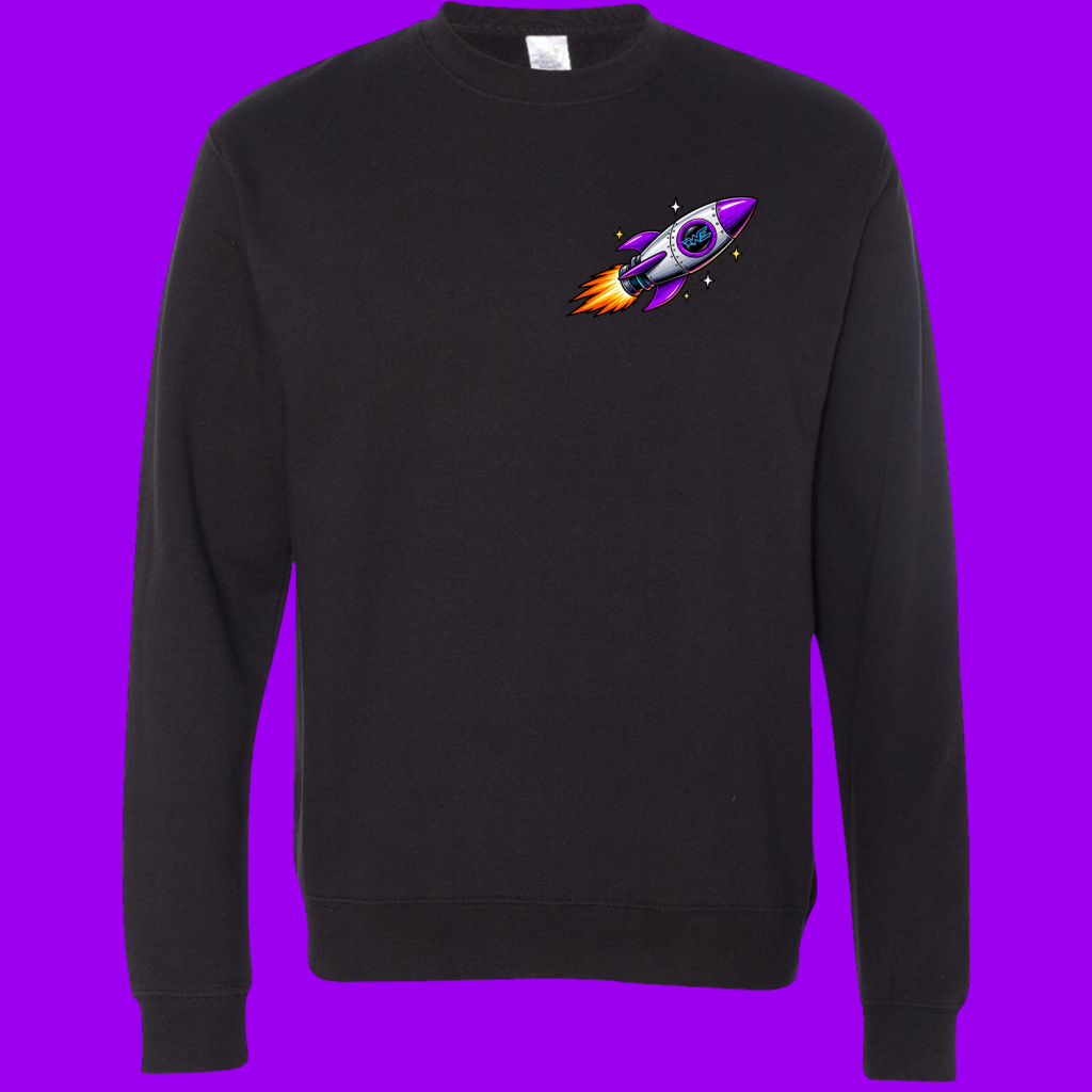 Rocket graphic on the upper-left chest of a black sweatshirt; purple rocket with orange flames and small stars nearby.